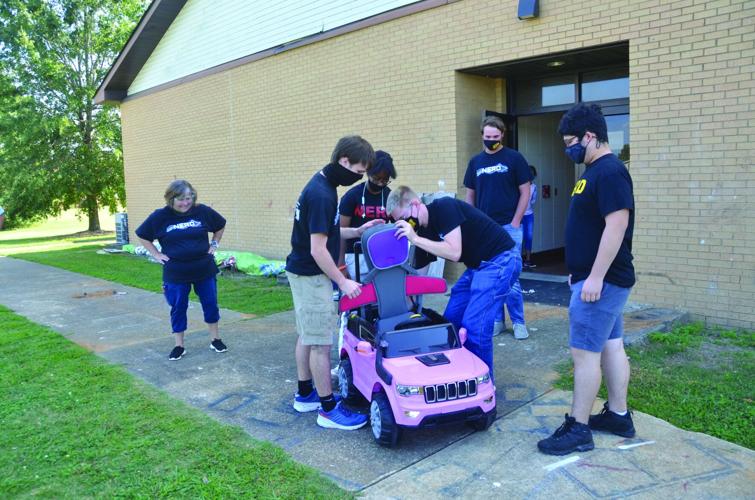Stella’s got a car: WHS students modify motorized toy car for toddler with disabilities