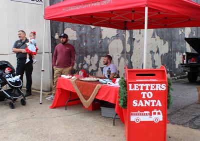 Fire department delivering letters to Santa