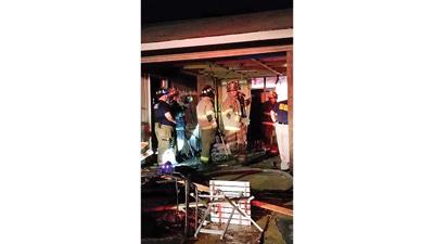 EFD: Homeowners used garden hose to extinguish fire