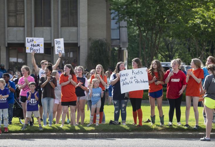 PHOTOS: Children, parents protest for kids to play ball