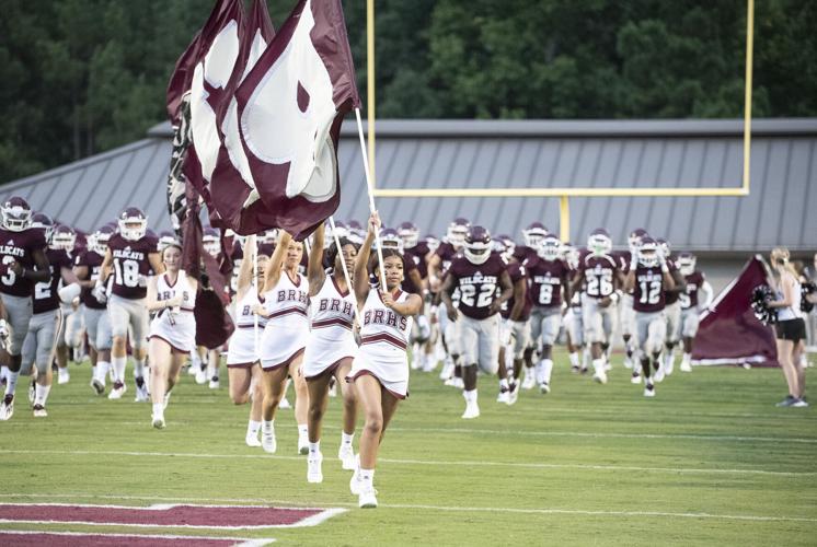 PHOTOS: Ben Russell hosts Huffman in the first game of the season
