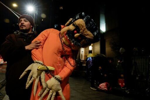 Protesters outside the Manhattan courthouse held an inflatable figure of ousted Venezuelan president Nicolas Maduro handcuffed
