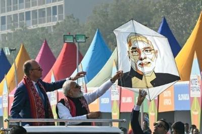 German Chancellor Friedrich Merz (L) and Indian Prime Minister Narendra Modi attended a kite flying festival ahead of their meeting