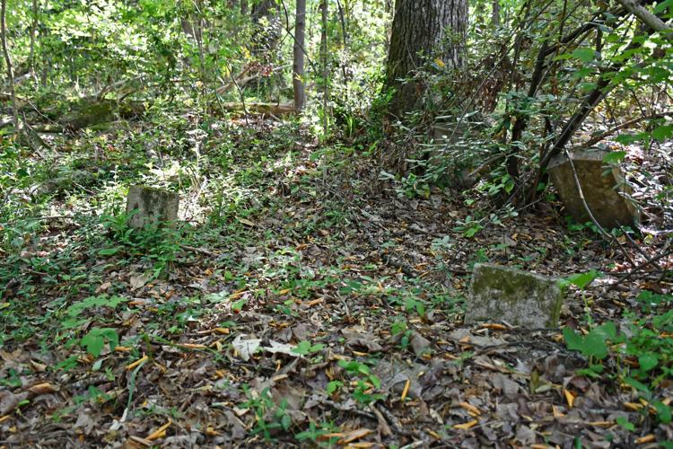 PHOTOS: Dozens of old Youngsville graves lie in the woods of the Russell Mills estate