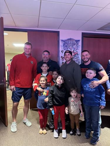 Florida Panthers Captain Aleksander Barkov with BSAC families of the fallen