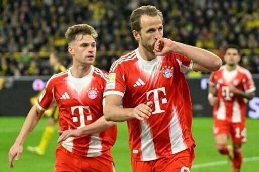 Harry Kane (R) has scored 45 goals for Bayern Munich this season