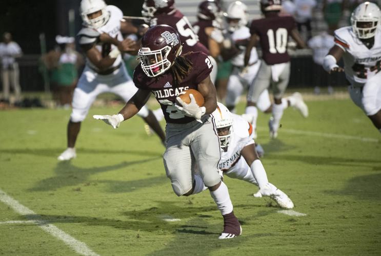 PHOTOS: Ben Russell hosts Huffman in the first game of the season