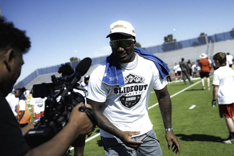 Deebo Samuel giving back to the kids and keeping cool with Frogg Toggs in the Las Vegas heat at Slideout Academy