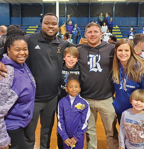 LD Bell helps coaches, players on both sides of rivalry