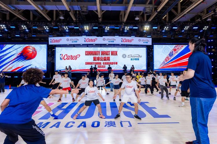 An NBA coach leads a basketball clinic, guiding a group of MSO members through basketball skills training at the Community Basketball Carnival during the Impact Week. Through demonstrations and personalized instruction, she helped participants enhance t...