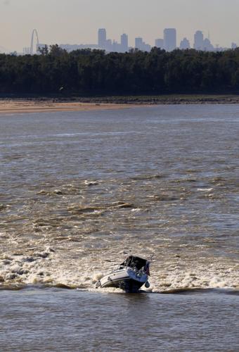 Boat stuck on rocks in Mississippi River