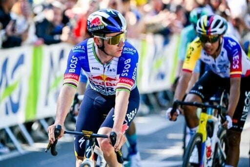 Olympic champion Remco Evenepoel (L) tipped his hat to Paul Seixas, 'one of the best climbers in the world'
