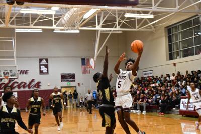 Wildcats ‘getting that mystery going’ with big wins in holiday tournament