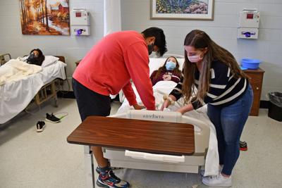 Local schools weigh new mask policies for August while urging staff to get vaccinated