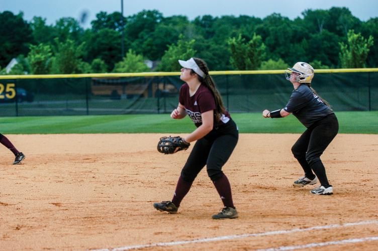 PHOTOS: Area teams play in regional softball tourney