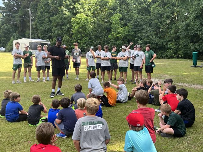 Edgewood Academy's Wanogho Jr. visits EA youth football camp