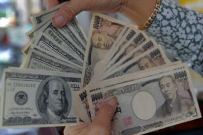 The dollar fell to as low as 153.89 yen amid talk of a possible joint intervention to support the Japanese unit