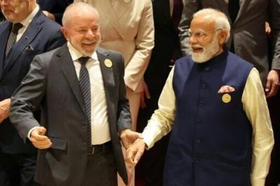 Brazil's President Luiz Inacio Lula da Silva (L) and Indian Prime Minister Narendra Modi are expected to discuss efforts to increase trade links