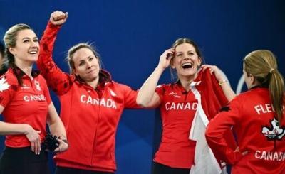 (From L) Canada's Emma Miskew, Rachel Homan, Sarah Wilkes and Tracy Fleury beat the USA to take bronze in the Olympic women's curling competition