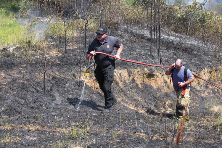 PHOTOS: Brush fire between Riverchase Drive and Sturdivant Road