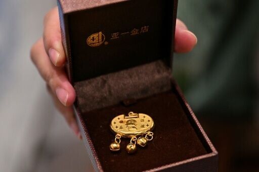 Chinese families traditionally purchase gold to mark special occasions like births and weddings