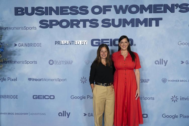 Andrea Brimmer, Ally Chief Marketing and Public Relations Officer, (left) and iHeart’s Sarah Spain are photographed at Deep Blue Business of Women’s Sports Summit at Chelsea Industrial on Tuesday, April 14, 2026, in New York, New York. (Calla Kessler/AP...
