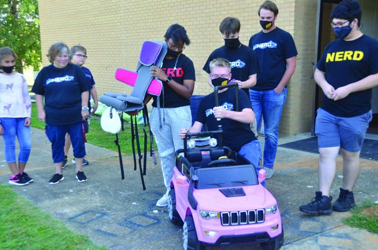 Stella’s got a car: WHS students modify motorized toy car for toddler with disabilities