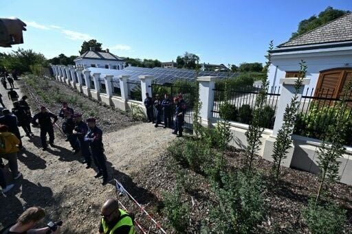 Police guard an entrance to the sprawling Hatvanpuszta manor owned by Hungarian Prime Minister Viktor Orban's father near Budapest