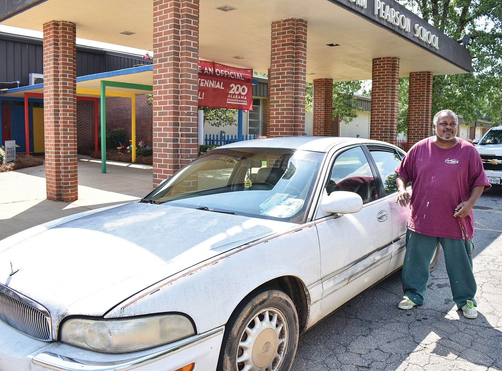Jim Pearson custodian surprised with news of new car