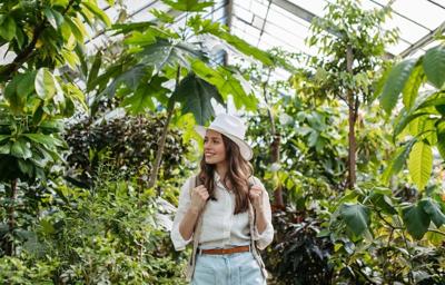 woman in botanical garden greenhouse