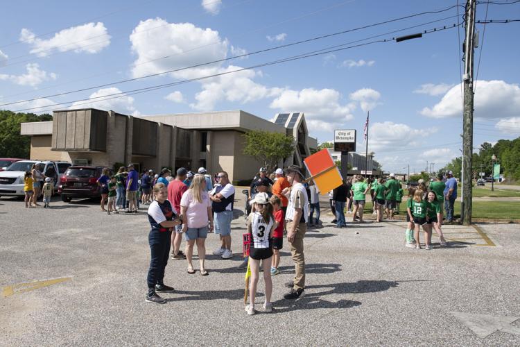 PHOTOS: Children, parents protest for kids to play ball