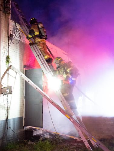 Photos: Firefighters battle blaze at McGhee Furniture Warehouse
