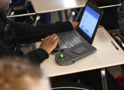 Cliff Williams / TPI Administrators drop into classrooms at Stanhope Elmore unannounced to make sure students are using the cellphone pouches.