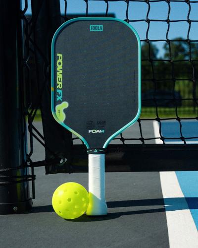 JOOLA's POWER FX paddle, shown in the Daydream (green/teal) colorway. POWER FX measures 16mm and retails for $179.95, available starting September 30 at retailers nationwide and on JOOLA.com. (PRNewsfoto/JOOLA)