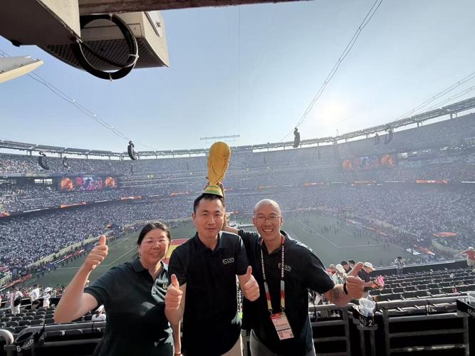 L to R: Selina Zhou, CSTS China; Wenbin Wang, CSTS Enterprises; Bill Bao, Connexus Travel Beijing at FIFA World Cup Final, New York New Jersey Stadium on July 19, 2026.