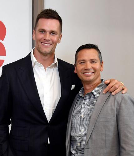 Tom Brady and Alex Guerrero at a recent event. TBRx, founded by Guerrero, and BrainTap Sports have announced a strategic partnership to integrate advanced brain fitness, recovery, and performance optimization technologies into the TBRx athlete developme...