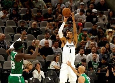 Victor Wembanyama launches one of his eight three-pointers in San Antonio's defeat of the Boston Celtics