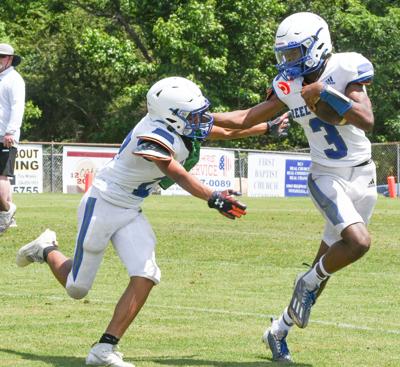 Smith takes reins on Reeltown offense