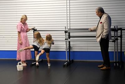 Cliff Williams / TPI Wetumpka Mayor Jerry Willis watches a dance demonstration at Studio 1 Eleven owned by Grayson Elijah. City officials joined the Wetumpka Area Chamber of Commerce for a ribbon cutting last week.
