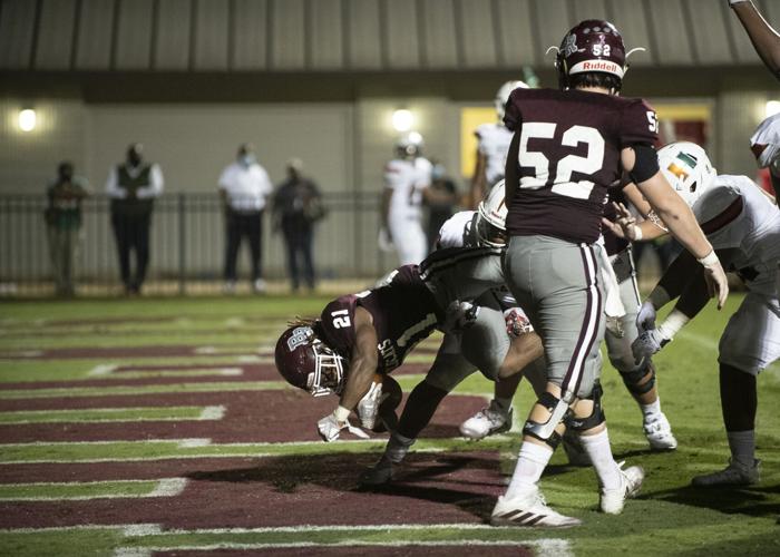 PHOTOS: Ben Russell hosts Huffman in the first game of the season