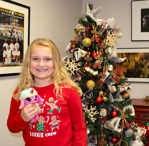 Fourth grader sings in Christmas parade