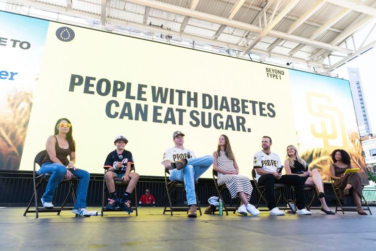 From left, Kristen Marchetti; Trenner Marchetti; Padres pitcher Mason Miller; Jordan Miller; Padres pitcher Michael King; Sheila King, co-founder of the King of the Hill Foundation; and Tiana Cooks of Beyond Type 1 participate in a panel during No Curve...