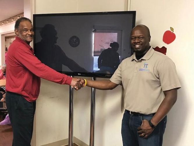 Local company donates TV to nursing center