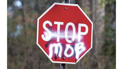 City officials look to stop vandalism of street signs