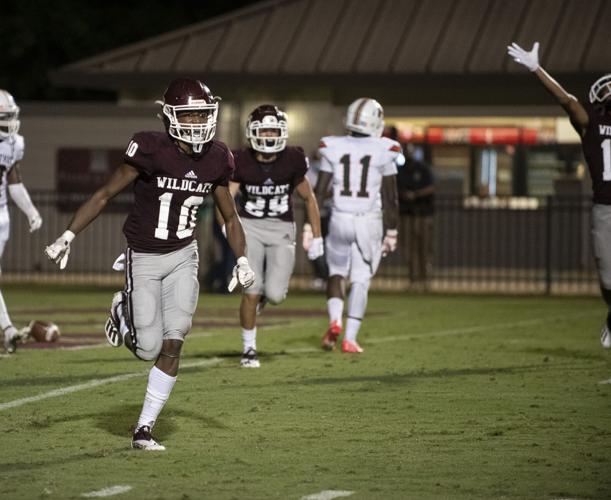 PHOTOS: Ben Russell hosts Huffman in the first game of the season