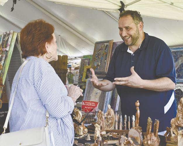 PHOTOS: One-of-a-kind artwork showcased at Arti Gras