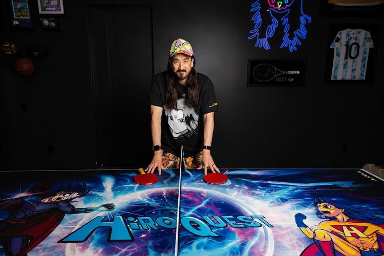 Steve Aoki with the limited-edition JOOLA x Steve Aoki HiROQUEST Infinity Carbon table tennis rackets, available October 6, 2026, exclusively at JOOLA.com.