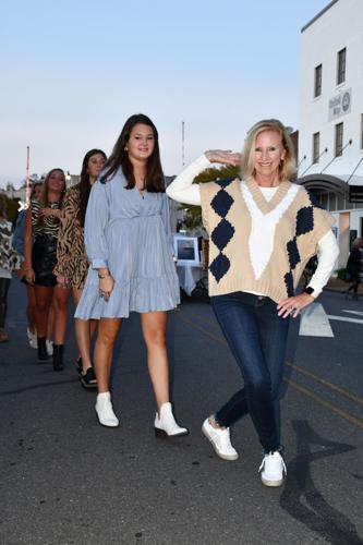 PHOTOS: Models strut down Main Street at 'Sip, Shop and Support'