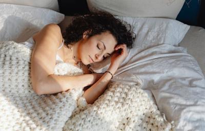 woman sleeps in luxury hotel