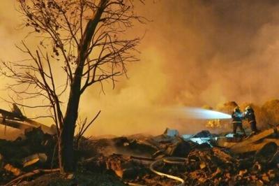 The death toll from a massive explosion at a fireworks factory in central China has risen to 26